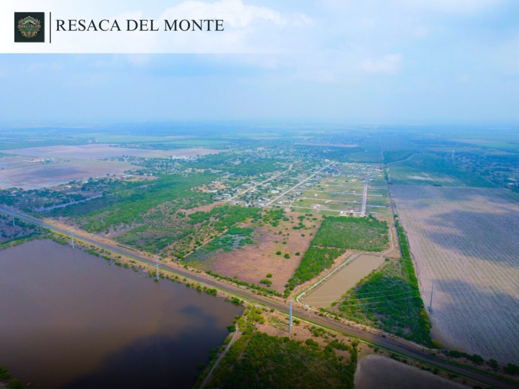 Aerial view of farmland and residential layout.